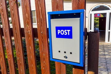 Mail box on the fence