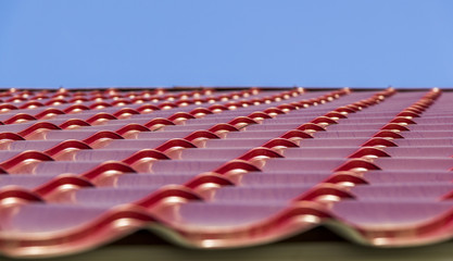 red metal roof tiles