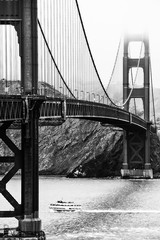Golden Gate bridge in black and white with foggy sky in winter