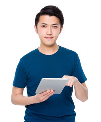 Asian man use of the tablet pc