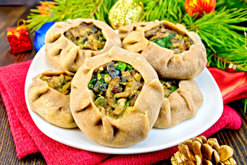Carols with mushrooms on napkin with Christmas toys