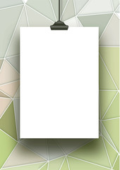 Single hanged vertical paper sheet with clip on greenish abstract background 