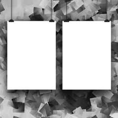 Two hanged paper sheets with clips on grey abstract background