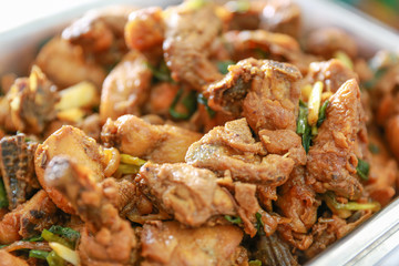 Sauteed spicy chicken with herb, close up