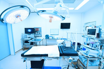 equipment and medical devices in modern operating room take with art lighting and blue filter