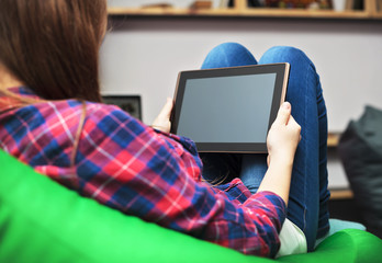 Tablet in woman hand
