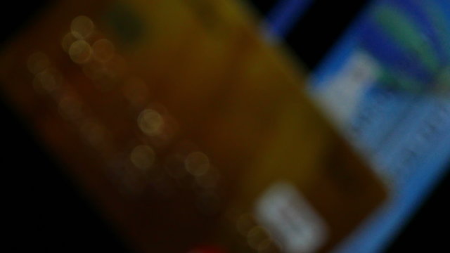 
Two Credit cards on  black background rotates. 4K 3840x2160 

