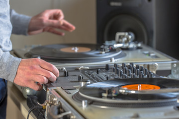 Naklejka premium DJ mixing at home