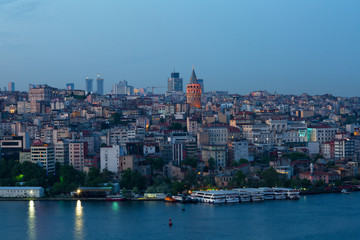 View of the passage the Gold Horn, Beyoglu's region and Galata Tower in sunset