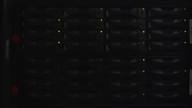 Video of lights blinking with cables and wires in network server room