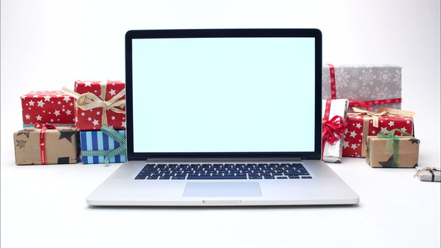 Online Shopping - Ordering Christmas Gifts On Laptop Computer. Stop Motion Animation.