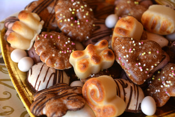 Christmas decorated gingerbread cookies on a plate on a table 