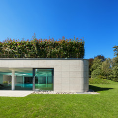 Modern house, garden with indoor pool, outdoors