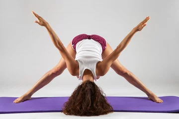 Sexy woman doing yoga exercises © rvas