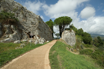 Fototapeta na wymiar Ancient megalithic doorgate in Norba, Italy