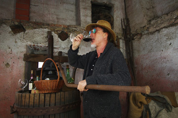 winemaker drinking red wine