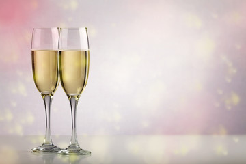 Two champagne glasses with copy space
