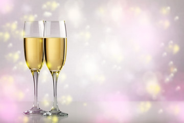 Two champagne glasses with copy space