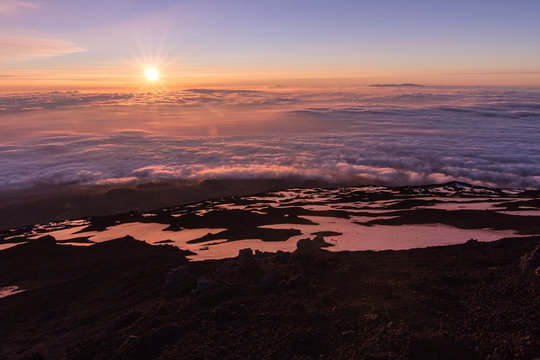 The summit craters of the Etna volcano at sunset