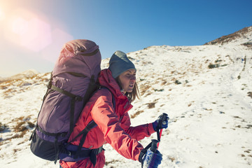 Fototapeta premium Active girl with a backpack.