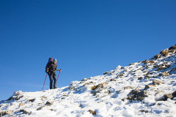 Climber is on the slope.