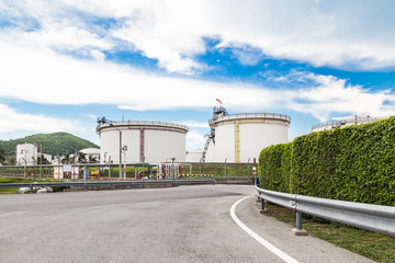 Oil tanks with blue sky