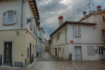 Fototapeta na wymiar Old town street with store in Koper in Slovenia