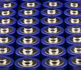 View macro of several AA blue batteries. 