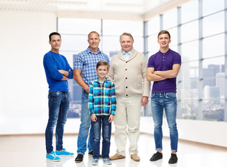 group of smiling men and boy