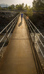 walking child on the suspension bridge