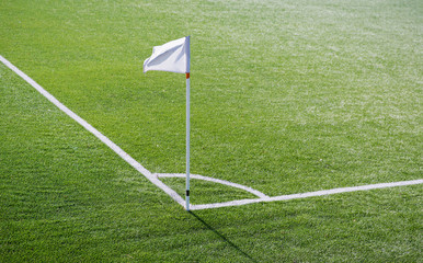 close up of football field corner with flag marker