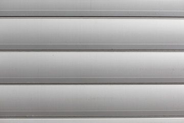Fototapeta premium close up of aluminum metal garage door backdrop