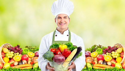 Chef man with vegetables.