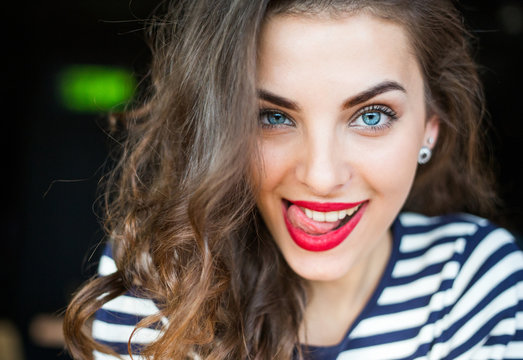 Close up portrait of beautiful smiling young woman