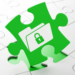 Business concept: Folder With Lock on puzzle background