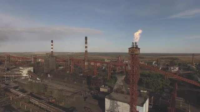 Aerial view of industrial infrastructure, at the Coke production. 4K