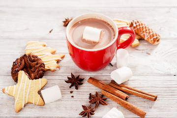 Christmas mood , festive cookies with cocoa and cinnamon on a wooden background