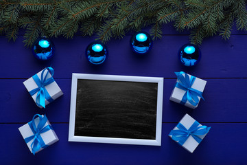 Beautiful wooden christmas background with wooden icons of snowflakes, Christmas trees, stars. New Year's holidays. Insert text. Christmas decorations. Wooden board rustic