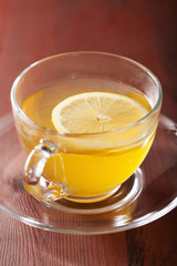 hot lemon ginger tea in glass cup