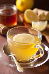 hot lemon ginger honey tea in glass cup