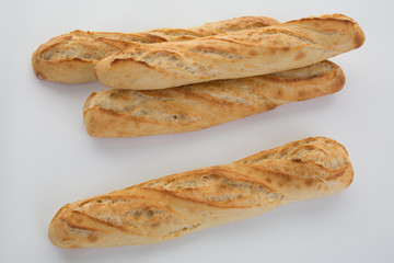 Four French baguette. Isolated on the white background.