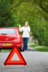 Female Driver Broken Down On Country Road