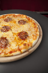 pepperoni pizza with sausage