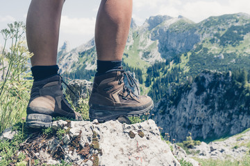 Climbing in the mountains with mountain boots