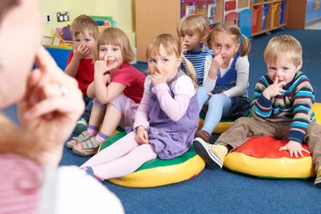 Foto op Plexiglas Group of Children Copying Teacher in Preschool Class © highwaystarz