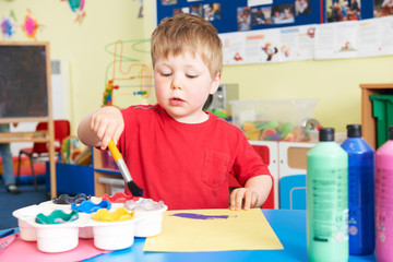 Pre School Boy Enjoying Painting Class