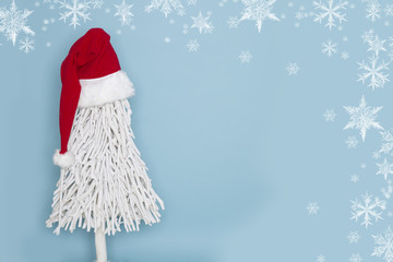 Christmas tree wearing a Santa Claus hat
