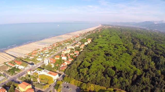 Aerial :  180&deg; panoramic views of the beach and the sea coast in summer Tuscany Italy