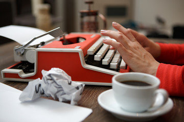 Side view of typewriter on desk