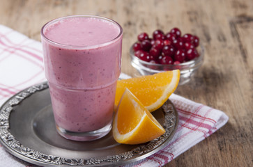 Smoothies and orange and cranberries .